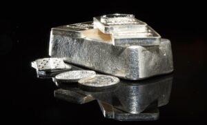 Close up of silver bullion with blank dark black background