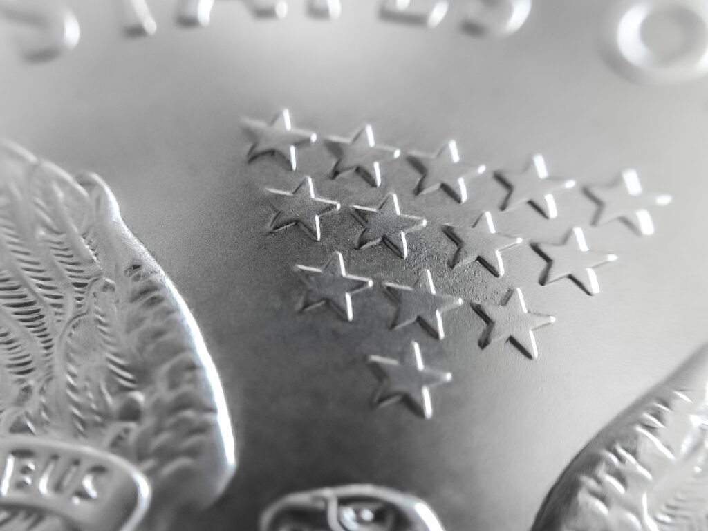 macro shot of a silver canadian maple leaf bullion coin