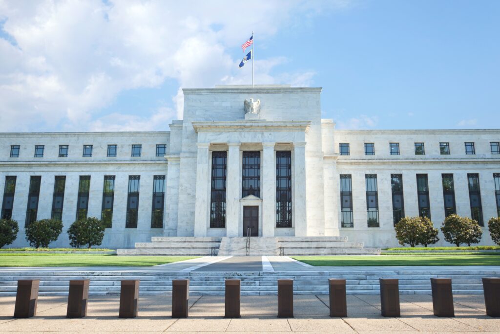 front of the federal reserve building, a private banking institution that controls the supply of money
