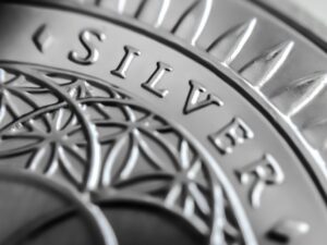 closeup-grayscale-of-a-coin-with-silver-writing-2023-11-27-05-31-12-utc