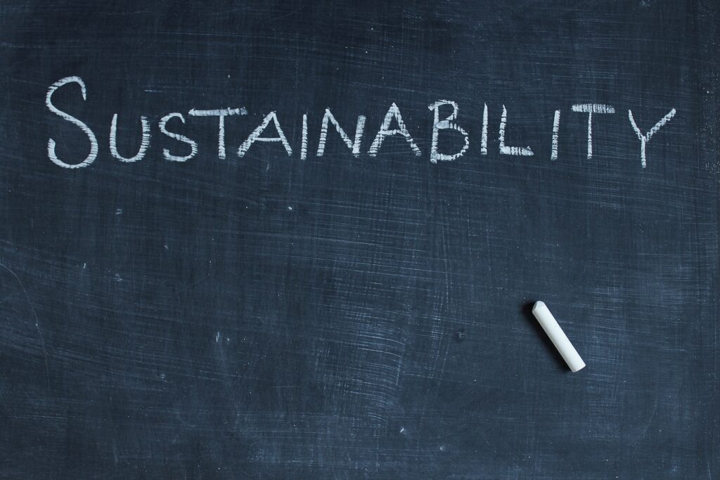 the word sustainability written on a chalkboard